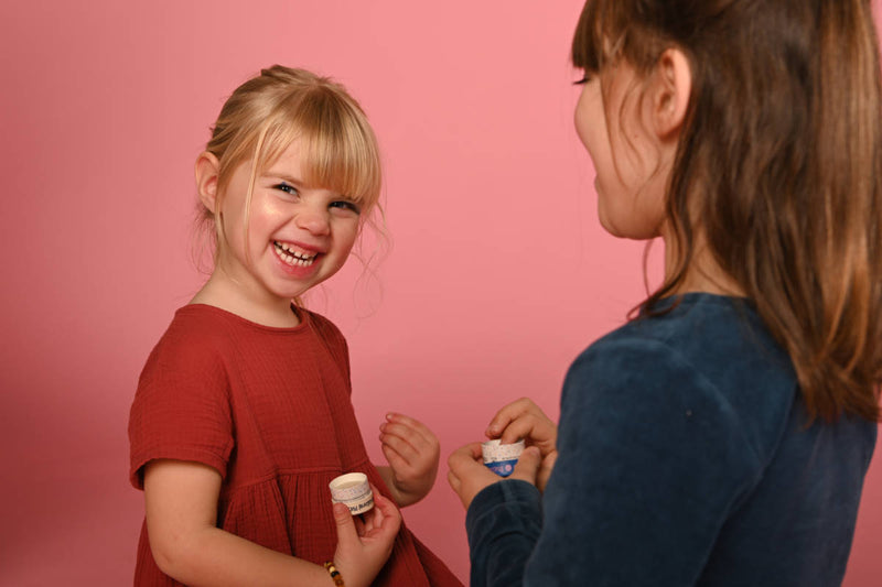 Two girls playing with Ivy & Loulou natural play makeup